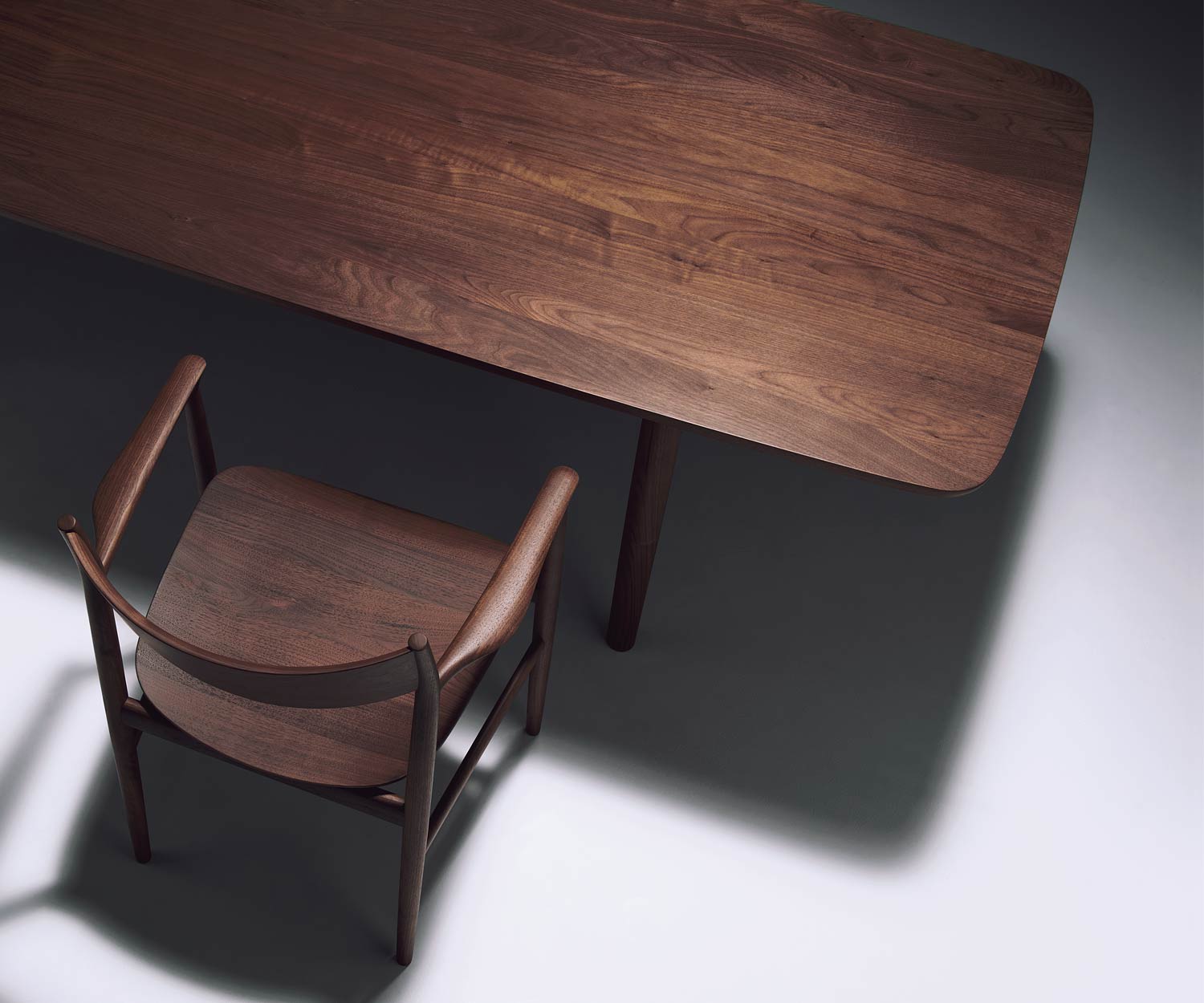 Conde House Kamuy design table in solid walnut table top in veneer